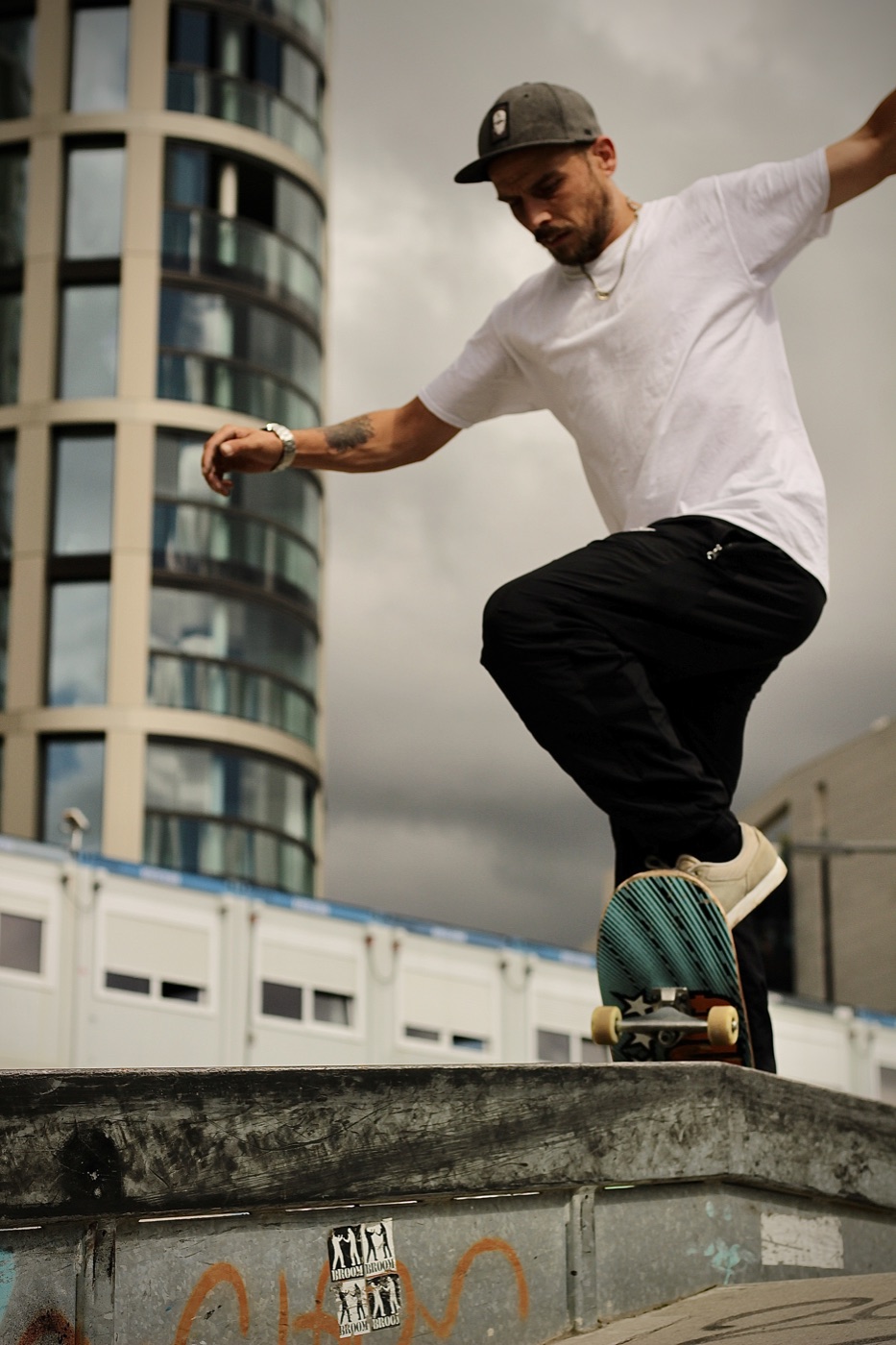 Urban action portrait of a skateboarder.